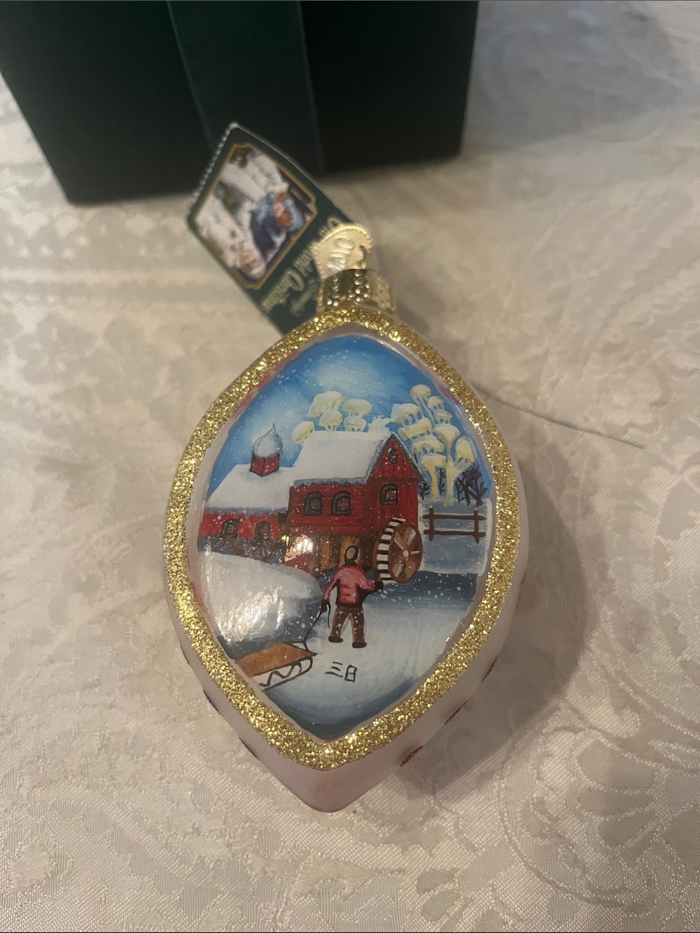 Old World Merck Family Holiday Ornament with Gold Trim Inside bottle painting